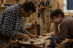 Luthier Jay Lichty with acoustic guitar building workshop student